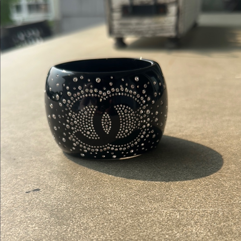 CHANEL Black Cuff with Crystal Embellishments